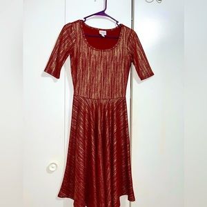 LulaRoe! Size XS. You won’t be able to find this anywhere!